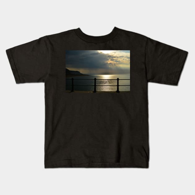 View out to sea as rain approaches Kids T-Shirt by vkirbys